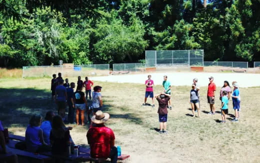 a group of people playing football