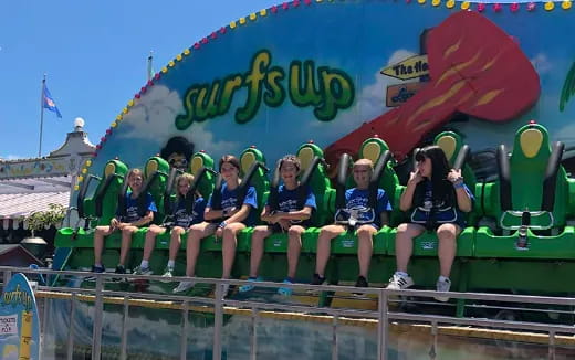 a group of people sitting on a ride