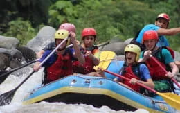 a group of people in a raft