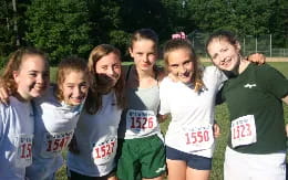 a group of girls posing for a photo