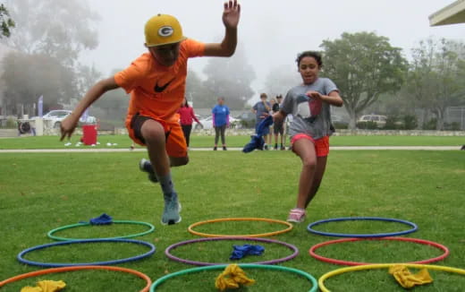 a boy jumping in the air