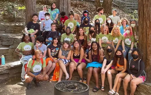 a group of people posing for a photo