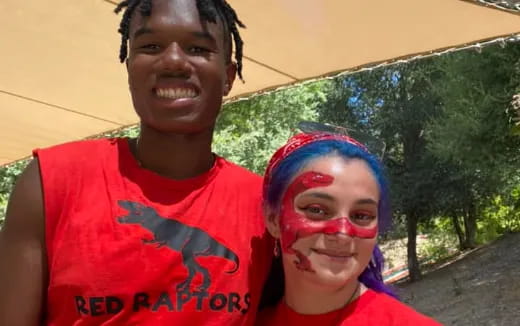 a man and a woman with paint on their faces