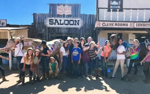 a group of people posing for a photo