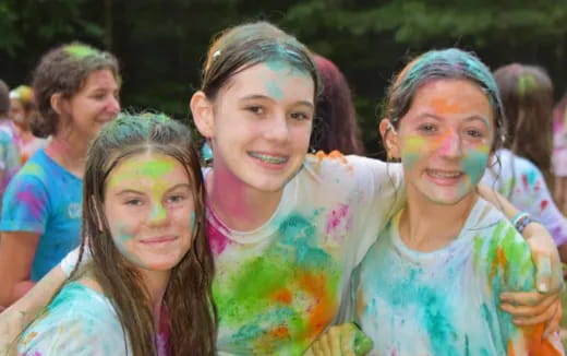 a group of children with paint on their faces