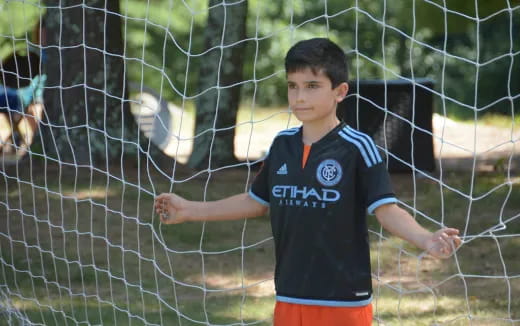 a boy in a black shirt