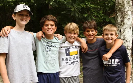 a group of boys posing for a picture