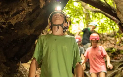 a group of people in a cave