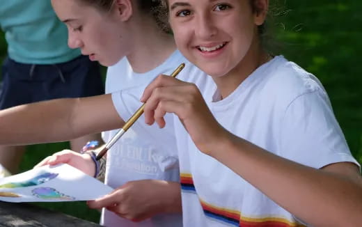 a few young children painting