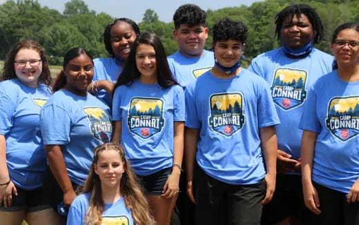 a group of people wearing matching t-shirts