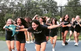 a group of girls in a line