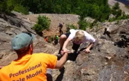 a few children digging in the dirt