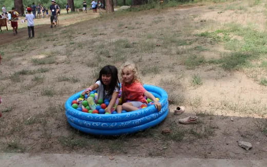 two girls in a pool