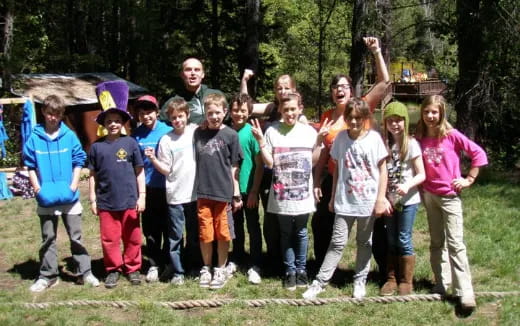 a group of people posing for a photo