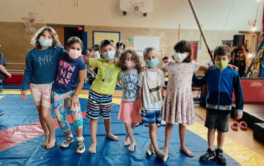 a group of children posing for a photo