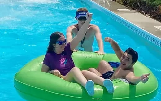 a group of people in a pool