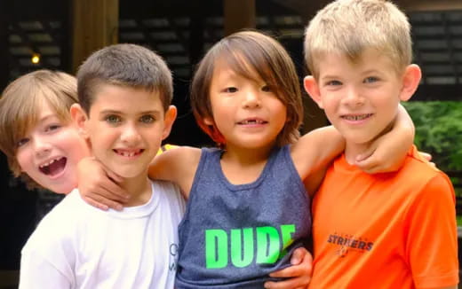 a group of children posing for a photo