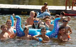 a group of people in a pool