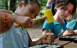 medium shot of kids using a computer