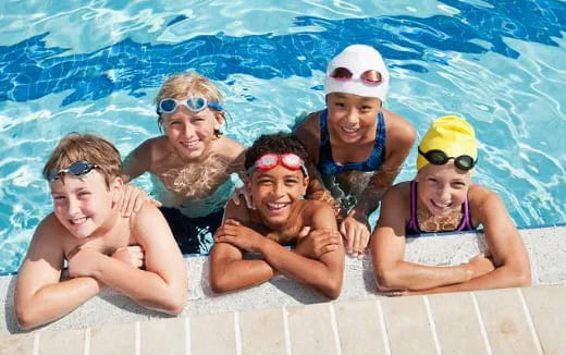 a group of people in a pool