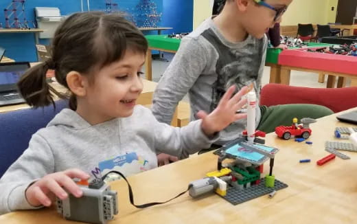 a young girl playing with toys