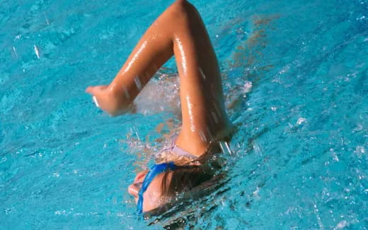 a person swimming in water