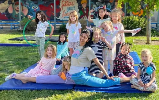 a group of children on a mat