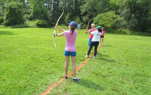 a group of people playing golf