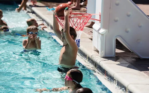 a group of people in a pool