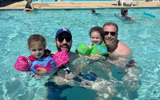 a group of people in a pool