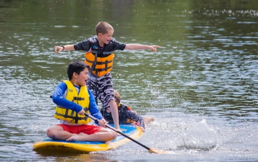 a group of people in a raft