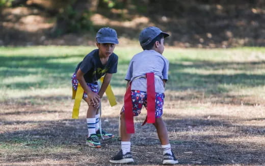 a couple of boys playing baseball