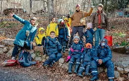 a group of people posing for a photo