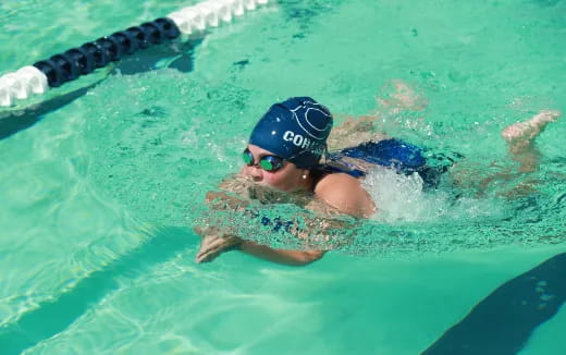 a person swimming in a pool