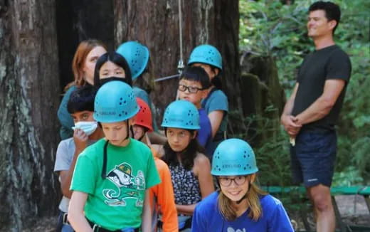 a group of people wearing helmets