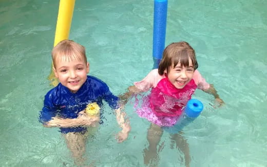 two children in a pool