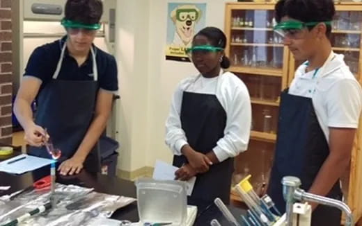 a group of people wearing safety goggles