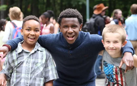 a group of people posing for the camera