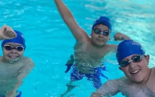 a group of people in a pool