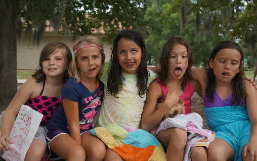 a group of girls posing for a photo