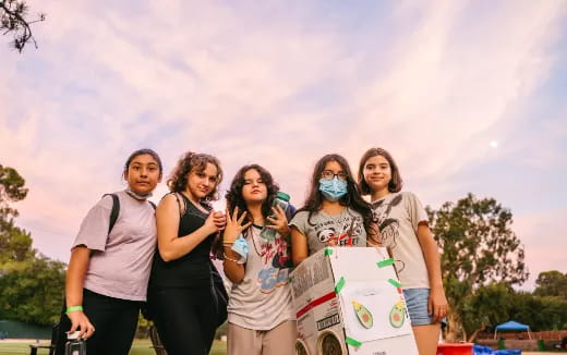 a group of people posing for a photo