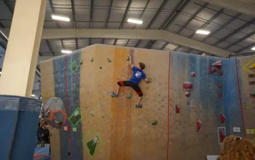 a person climbing a wall