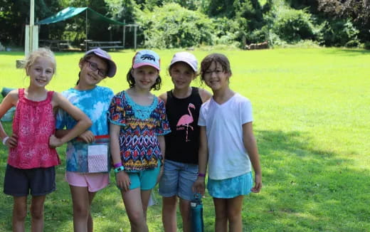 a group of children posing for a photo