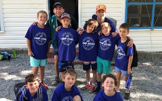 a group of kids posing for a photo