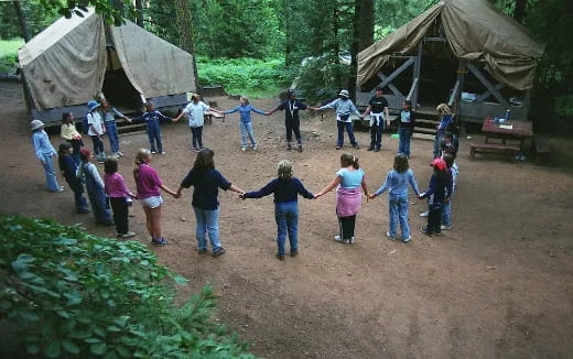 a group of people playing outside