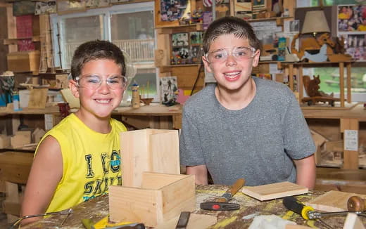 a couple of boys smiling