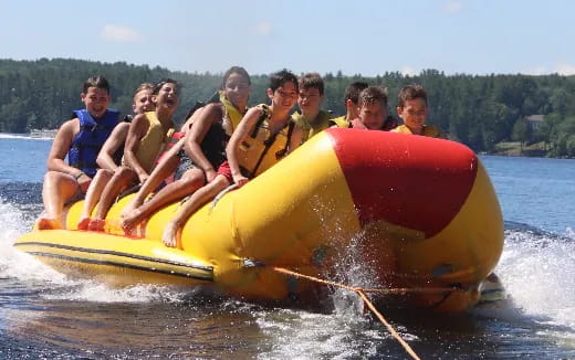 a group of people on a raft