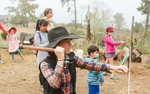 a group of people playing outside