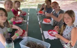 a group of girls eating food