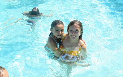 a group of people in a pool